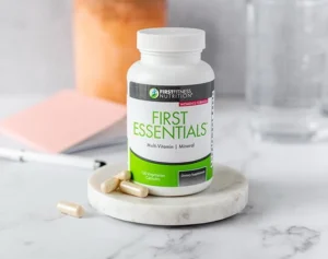 a bottle of multivitamins for women on a marble plate